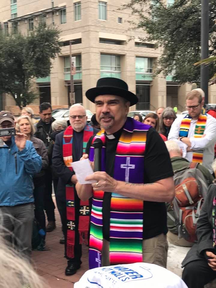 Rev. Dr. Miguel De La Torre attends a Tuscon protest